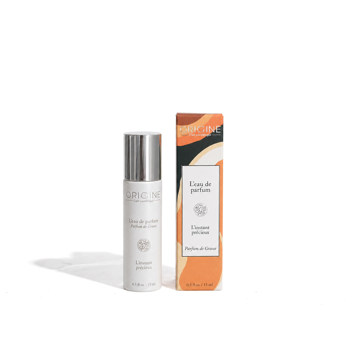 Flacon blanc nacré d'eau de parfum L'Instant Précieux 15 ml, collection Signature Origine