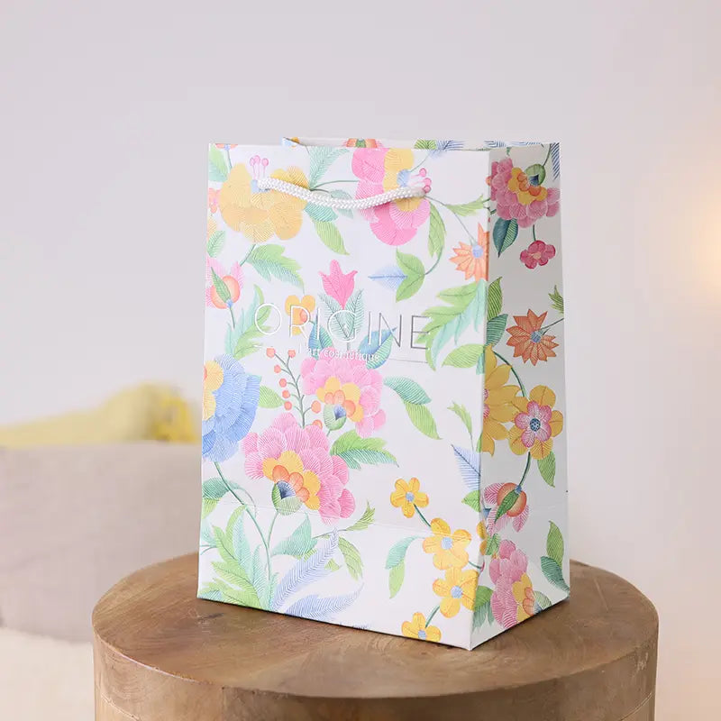 Sac cadeau Origine Flowers orné d'une illustration florale